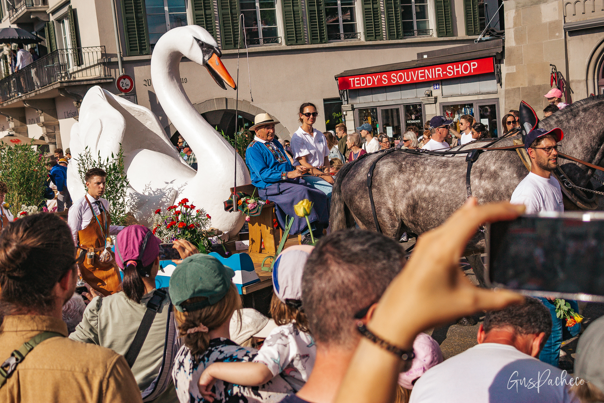 Sechseläuten — man holding mini Böögg on his head smiling at crowd