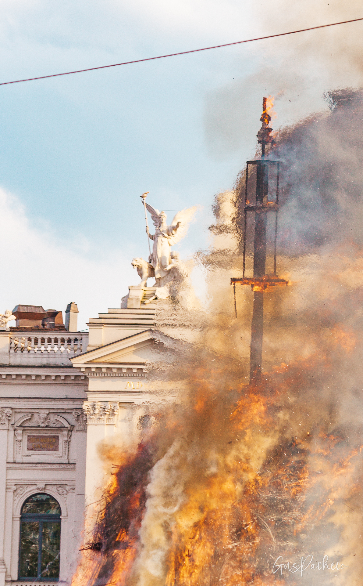 Sechseläuten — Böögg skeleton after explosion with angel statue of Opera House emerging from smoke