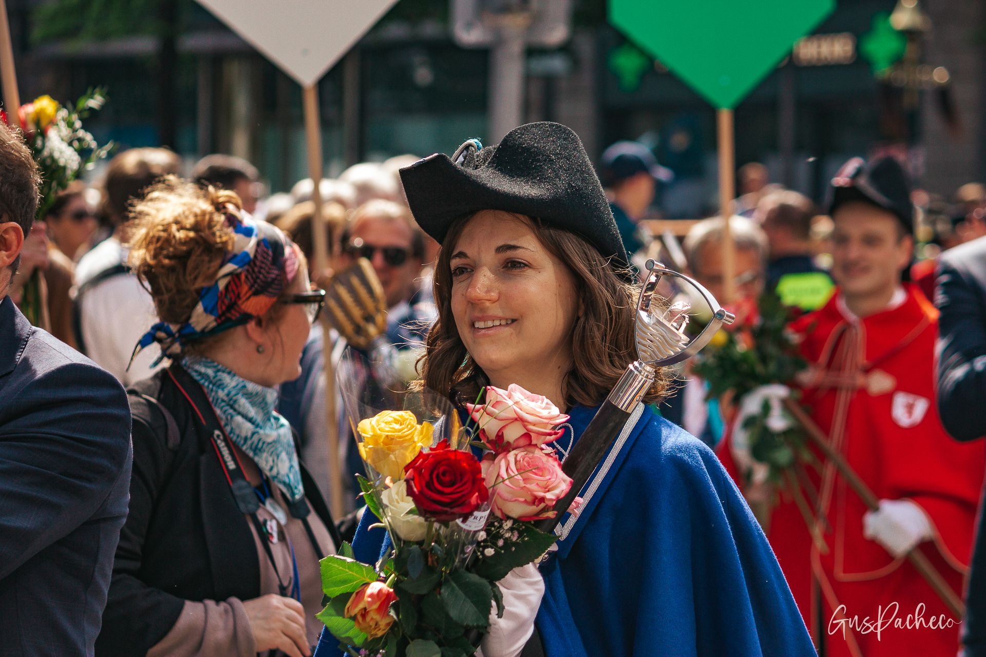 Sechseläuten — woman in historical guild dress with roses and sword